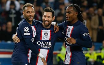 PSG's Argentinian forward Lionel Messi (C) celebrates his goal with his teammate Neymar Jr and Renato Sanches (R) during the UEFA Champions League Group H second leg football match between Paris Saint-Germain (PSG) and Maccabi Haifa FC at the Parc des Princes stadium in Paris, FRANCE - 25/10/2022.