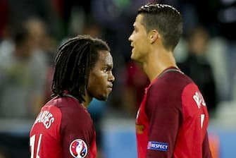 epa05365671 Portugal`s Renato Sanches (L) and Cristiano Ronaldo react after the UEFA EURO 2016 group F preliminary round match between Portugal and Iceland at Stade Geoffroy Guichard in Saint-Etienne, France, 14 June 2016.

(RESTRICTIONS APPLY: For editorial news reporting purposes only. Not used for commercial or marketing purposes without prior written approval of UEFA. Images must appear as still images and must not emulate match action video footage. Photographs published in online publications (whether via the Internet or otherwise) shall have an interval of at least 20 seconds between the posting.)  EPA/MIGUEL A. LOPES   EDITORIAL USE ONLY