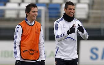 MADRID, SPAIN - DECEMBER 07: Cristiano Ronaldo (R) and Pablo Sarabia of Real Madrid smile during the training session at Valdebebas training ground, ahead of their UEFA Champions League Group G match against AJ Auxerre, on December 7, 2010 in Madrid, Spain. (Photo by Victor Carretero/Real Madrid)