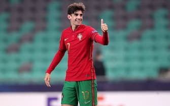 Portugal's Francisco Trincao celebrates scoring their side's second goal of the game from a penaltyduring the 2021 UEFA European Under-21 Championship group D match at the Stozice Stadium in Ljubljana, Slovenia. Picture date: Sunday March 28, 2021.