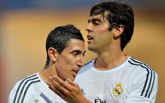 Real Madrid's Angel Di Maria (R) celebrates with Real Madrid's Kaka (R) after scoring a goal during the pre-season friendly football match between Bournemouth and Real Madrid at the Goldsands Stadium in Bournemouth, England on July 21, 2013. AFP PHOTO/BEN STANSALL        (Photo credit should read BEN STANSALL/AFP via Getty Images)