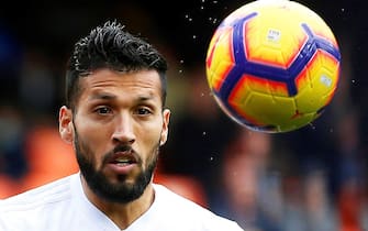 epa08295339 (FILE) - Valencia's Ezequiel Garay in action during the Spanish La Liga soccer match between Valencia CF and Real Sociedad in Valencia, eastern Spain, 10 February 2019 (re-issued on 15 March 2020). Valencia's Ezequiel Garay was tested positive for coronavirus, the player confirmed on 15 March 2020. All Spanish La Liga soccer matches have been suspended amid the coronavirus COVID-19 pandemic.  EPA/MIGUEL ANGEL POLO