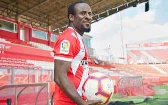 epa06981268 Ivory Coast's forward Seydou Doumbia poses for photographers during his presentation as new player of Primera Division team Girona FC at Estadi de Montilivi stadium in Girona, northeastern Spain, 29 August 2018. Doumbia signed a contract for next three seasons.  EPA/Robin Townsend