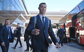BGUK_2515145 - Lisbon, PORTUGAL  -  Portuguese footballer Cristiano Ronaldo seen arriving at Lisbon Airport by Bus To Depart For Qatar World Cup.

Pictured: Cristiano Ronaldo

BACKGRID UK 18 NOVEMBER 2022 

UK: +44 208 344 2007 / uksales@backgrid.com

USA: +1 310 798 9111 / usasales@backgrid.com

*UK Clients - Pictures Containing Children
Please Pixelate Face Prior To Publication*