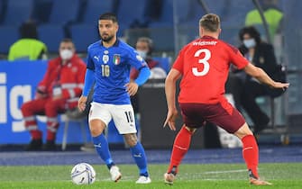 ROME, ITALY - November 12 : Lorenzo Insigne  ( L) of  Italy competes for the ball  Silvan Widme (R) of Svizzera  during the  World Cup Qualifiers Group C soccer match between  Italy and Svizzera Stadio Olimpico on November 12,2021 in Rome Italy