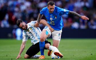 Argentina&#x92;s Nicolás Tagliafico tackles Italy&#x92;s Federico Bernardeschi during the Finalissima 2022 match at Wembley Stadium, London. Picture date: Wednesday June 1, 2022.