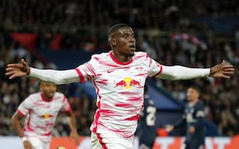 epa09533053 Nordi Mukiele of Leipzig celebrates after scoring the 2-1 lead during the UEFA Champions League group A soccer match between Paris Saint-Germain (PSG) and RB Leipzig in Paris, France, 19 October 2021.  EPA/Christophe Petit Tesson