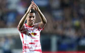Bergamo, Italy. 14th Apr 2022. Tyler Adams of RB Leipzig  celebrates after winning the  UEFA Europa League Quarter Final Leg Two match between Atalanta BC and RB Leipzig at Gewiss stadium on April 14, 2022 in Bergamo, Italy . Credit: Marco Canoniero/Alamy Live News