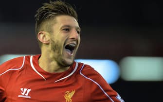 epa04542562 Liverpool's Adam Lallana celebrates scoring the second goal making the score 2-0 during the English Premier League soccer match between Liverpool and Swansea at the Anfield in Liverpool, Britain, 29 December 2014.  EPA/PETER POWELL DataCo terms and conditions apply http://www.epa.eu/files/Terms%20and%20Conditions/DataCo_Terms_and_Conditions.pdf