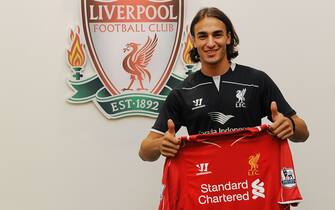 LIVERPOOL, ENGLAND - JULY 15:  (THE SUN OUT, THE SUN ON SUNDAY OUT) (EXCLUSIVE COVERAGE) (PREMIUM PRICING APPLIES) (MINIMUM PRINT/BROADCAST FEE OF GBP 150, ONLINE FEE OF GBP 75 PER IMAGE, OR LOCAL EQUIVALENT) Lazar Markovic poses as he is unveiled as a new signing for Liverpool Football Club at Melwood Training Ground on July 15, 2014 in Liverpool, England.  (Photo by Andrew Powell/Liverpool FC via Getty Images)