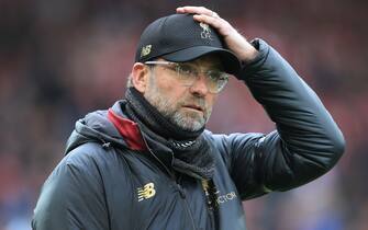 LIVERPOOL, ENGLAND - APRIL 14: Liverpool manager Jurgen Klopp looks dejected as he adjusts his cap during the Premier League match between Liverpool and Chelsea at Anfield on April 14, 2019 in Liverpool, United Kingdom. (Photo by Simon Stacpoole/Offside/Getty Images)