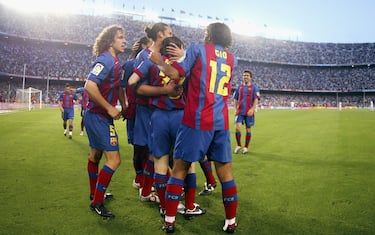 BARCELONA, SPAIN - MAY 1:  FC Barcelona players celebrate Leo Messi's goal during the La Liga match between FC Barcelona and Albacete on May 1, 2005 at Camp Nou stadium in Barcelona, Spain. (Photo by Luis Bagu/Getty Images)