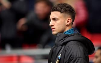 Newcastle United's new signing Antonio Barreca takes his place on the bench for the Premier League match at Wembley Stadium, London.