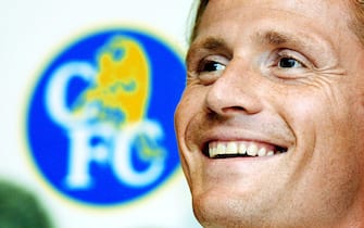 LON01 - 20010626 - LONDON, UNITED KINGDOM : Emmanuel Petit reacts to a question from a reporter during a press conference at Chelsea football club at Stamford Bridge in London Tuesday 26 June 2001. French international Petit signed for the west London club after leaving Barcelona. 
EPA PHOTO EPA/ADRIAN DENNIS/ad/ao