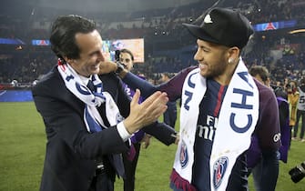 PARIS, FRANCE - MAY 12: Coach of PSG Unai Emery, Neymar Jr celebrate during the French Ligue 1 Championship Trophy Ceremony following the Ligue 1 match between Paris Saint-Germain (PSG) and Stade Rennais (Rennes) at Parc des Princes stadium on May 12, 2018 in Paris, France. (Photo by Jean Catuffe/Getty Images)