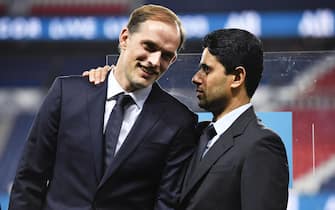 epa07388772 Paris Saint-Germain (PSG) president and CEO Nasser Al-Khelaifi (R) talks with PSG head coach Thomas Tuchel (L) after a signing ceremony for the new partnership of French Ligue 1 soccer club PSG and the Accor Group at the Parc des Princes in Paris, France, 22 February 2019.  EPA/JULIEN DE ROSA