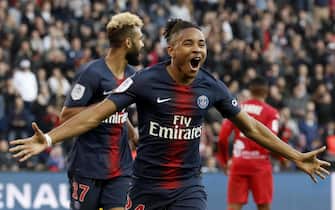 epa07390958 Paris Saint Germain's Christopher Nkunku celebrates after scoring the 1-0 goal during the French Ligue 1 soccer match between PSG and Nimes at the Parc des Princes stadium in Paris, France, 23 February 2019.  EPA/YOAN VALAT