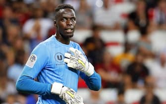 epa08693503 (FILE) - Goalkeeper Edouard Mendy of Reims reacts during the French Ligue 1 soccer match between OGC Nice and Stade Reims in Nice, France, 11 August 2018 (re-issued on 24 September 2020). English Premier League soccer club Chelsea FC have signed Senegalese goalkeeper Edouard Mendy from French Ligue 1 side Stade Rennes on a five-year contract, media reports confirmed on 24 September 2020.  EPA/SEBASTIEN NOGIER *** Local Caption *** 54547951