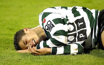 Cristiano Ronaldo lies injured playing for Sporting Lisbon aged 17, January 30, 2002, before his transfer to the English Premiership team Manchester United. (Photo by CityFiles/WireImage)