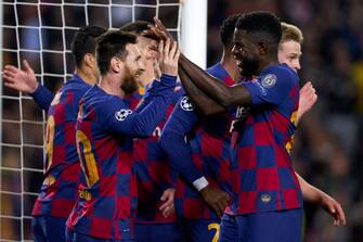 BARCELONA, SPAIN - NOVEMBER 27: Lionel Messi of FC Barcelona celebrates with teammates after scoring his team's second goal during the UEFA Champions League group F match between FC Barcelona and Borussia Dortmund at Camp Nou on November 27, 2019 in Barcelona, Spain. (Photo by Quality Sport Images/Getty Images)