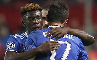 Juventus Croatian striker Mario Madzukic (R) celebrates the 1-3 goal for the team with Moise Kean (L) and Giorgio Chiellini the UEFA Champions League 5th round match between Sevilla and Juventus at Ramon Sanchez Pizjuan stadium in Seville, Andalusia, Spain, 22 November 2016. EFE/Jose Manuel Vidal