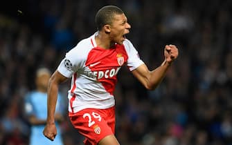 MANCHESTER, ENGLAND - FEBRUARY 21:  Kylian Mbappe of AS Monaco celebrates as he scores their second goal during the UEFA Champions League Round of 16 first leg match between Manchester City FC and AS Monaco at Etihad Stadium on February 21, 2017 in Manchester, United Kingdom.  (Photo by Stu Forster/Getty Images)