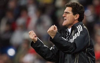 Madrid, SPAIN: Real Madrid's Italian coach Fabio Capello shouts instructions to his players during the first leg of a last 16 Champions League football match against Bayern Munich at the Santiago Bernabeu stadium in Madrid, 20 February 2007. Real Madrid won 3-2. AFP PHOTO/JAVIER SORIANO (Photo credit should read JAVIER SORIANO/AFP via Getty Images)