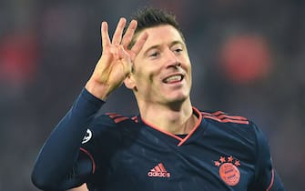 TOPSHOT - Bayern Munich's Polish forward Robert Lewandowski celebrates scoring his team's fourth goal during the UEFA Champions League group B football match between Red Star Belgrade (Crvena Zvezda Belgrade) and Bayern Munich at the "Rajko Mitic" stadium in Belgrade, on November 26, 2019. (Photo by ANDREJ ISAKOVIC / AFP) (Photo by ANDREJ ISAKOVIC/AFP via Getty Images)