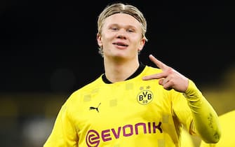 epa08840044 Erling Haaland of Borussia Dortmund celebrates after scoring their sides third goal during the UEFA Champions League Group F stage match between Borussia Dortmund and Club Brugge KV at Signal Iduna Park in Dortmund, Germany,24 November 2020.  EPA/LARS BARON / POOL