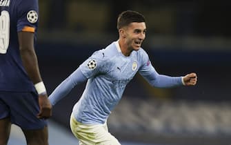 epa08763314 Ferran Torres (C) of Manchester City celebrates after scoring the lead 3-1 during the UEFA Champions League group C soccer match between Manchester City and FC Porto in Manchester, Britain, 21 October 2020.  EPA/Tim Keeton / POOL