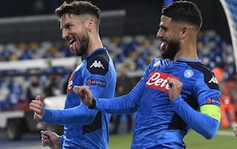 Napoli's Dries Mertens (L) jubilates with his teammate Lorenzo Insigne after scoring the goal during the first leg of the UEFA Champions League round of 16 soccer match SSC Napoli vs FC Barcelona at the San Paolo stadium in Naples, Italy, 25 February 2020. ANSA/CIRO FUSCO 