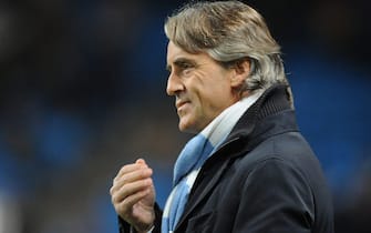 epa03481066 Manchester City manager Roberto Mancini on the touchline during the UEFA Champions League match between Manchester City and Real Madrid at The Etihad Stadium in Manchester, Britain, 21 November 2012.  EPA/PETER POWELL