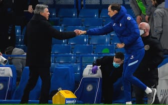 epa09062771 Everton's manager Carlo Ancelotti (L) greets Chelsea's manager Thomas Tuchel (R) after the English Premier League soccer match between Chelsea FC and Everton FC in London, Britain, 08 March 2021.  EPA/Glyn Kirk / POOL EDITORIAL USE ONLY. No use with unauthorized audio, video, data, fixture lists, club/league logos or 'live' services. Online in-match use limited to 120 images, no video emulation. No use in betting, games or single club/league/player publications.