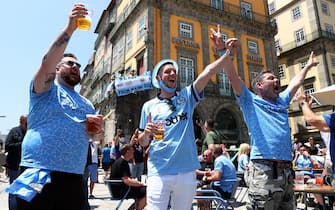 PORTO, PORTUGAL - MAY 29: Fans of Manchester City enjoy the pre match atmosphere in the city prior to the UEFA Champions League Final between Manchester City and Chelsea FC at Estadio do Dragao on May 29, 2021 in Porto, Portugal. (Photo by Michael Steele/Getty Images)