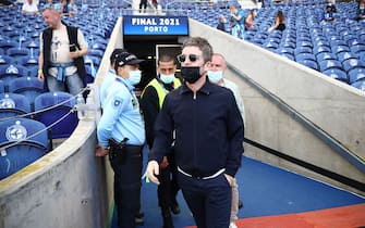Singer Noel Gallagher (C front) arrives ahead of the UEFA Champions League final football match between Manchester City and Chelsea at the Dragao stadium in Porto on May 29, 2021. (Photo by CARL RECINE / POOL / AFP) (Photo by CARL RECINE/POOL/AFP via Getty Images)