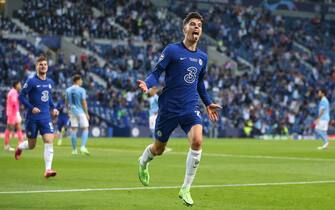 epa09235731 Kai Havertz of Chelsea celebrates after scoring the 1-0 lead during the UEFA Champions League final between Manchester City and Chelsea FC in Porto, Portugal, 29 May 2021.  EPA/Jose Coelho / POOL