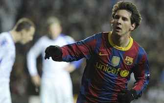 Barcelona's Argentinian forward Lionel Messi celebrates after scoring their first goal against FC Copenhagen during their Champions league group D football match at Parken stadium in Copenhagen on November 2, 2010. AFP PHOTO/JAVIER SORIANO. (Photo credit should read JAVIER SORIANO/AFP via Getty Images)