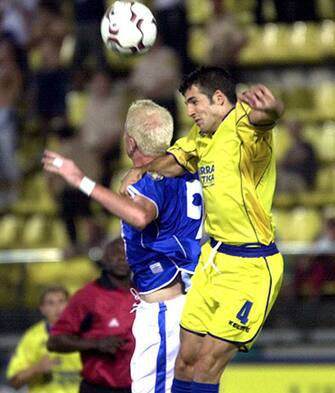 Villarreal's Pedro (R) fights for the ball with Italian Brescia's Tera (L) during their UEFA Intertoto Cup soccer match 19 July 2003 at the Villarreal stadium.  EPA PHOTO/EFE/DOMENECH CASTELLO