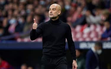 Manchester City head coach Pep Guardiola


 during the UEFA Champions League match, Quarter Final, Second Leg, between Atletico de Madrid and Manchester City played at Wanda Metropolitano Stadium on April 13, 2022 in Madrid, Spain. (Photo by Ruben Albarran / PRESSINPHOTO)