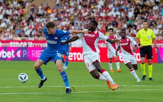 MONACO, MONACO - AUGUST 2:  (L-R) Guus Til of PSV, Youssouf Fofana of AS Monaco  during the UEFA Champions League  match between AS Monaco v PSV at the Stade Louis II on August 2, 2022 in Monaco Monaco (Photo by Photo Prestige/Soccrates/Getty Images)