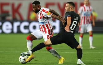 epa10135123 Red Star's Guelor Kangan (L) in action against   Maccabi's Neta Lavi (R) during the UEFA Champions League second leg play off match between Red Star Belgrade and Maccabi Haifa FC in Belgrade, Serbia, 23 August 2022.  EPA/ANDREJ CUKIC