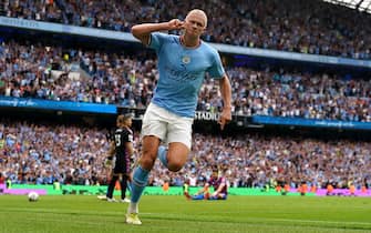 Manchester City's Erling Haaland celebrates scoring his sides fourth goal of the game to complete his hat trick during the Premier League match at the Etihad Stadium, Manchester. Picture date: Saturday August 27, 2022.