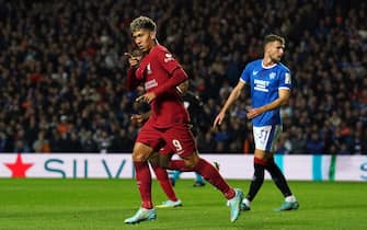 Liverpool's Roberto Firmino celebrates scoring their side's first goal of the game during the UEFA Champions League Group A match at the Ibrox Stadium, Glasgow. Picture date: Wednesday October 12, 2022.