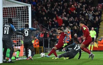 epa10280195 Liverpool's Mohamed Salah scores the 1-0 during the UEFA Champions League group A soccer match between Liverpool FC and SSC Napoli in Liverpool, Britain, 01 November 2022.  EPA/PETER POWELL