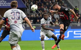 AC Milan's Olivier Giroud (R) scores goal of 1 to 0 during he UEFA Champions League group E soccer match between Ac Milan and Fc Salzburg at Giuseppe Meazza stadium in Milan, 2 November  2022.ANSA / MATTEO BAZZI