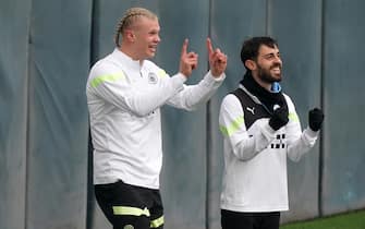 Manchester City's Erling Haaland and Bernardo Silva and during a training session at the City Football Academy, Manchester. Picture date: Monday April 10, 2023.
