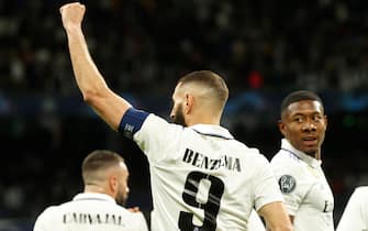 epa10569988 Real Madrid's striker Karim Benzema celebrates after scoring the 1-0 lead during the UEFA Champions League quarter final first leg soccer match between Real Madrid and Chelsea FC, in Madrid, Spain, 12 April 2023.  EPA/Chema Moya