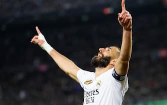 epa10560633 Real Madrid's striker Karim Benzema celebrates after scoring the 0-4 goal during the Spanish King's Cup semifinal second leg soccer match between FC Barcelona and Real Madrid, in Barcelona, Spain, 05 April 2023.  EPA/Enric Fontcuberta