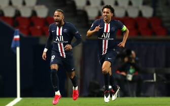 In this handout image provided by UEFA, Neymar of Paris Saint-Germain celebrates with Marquinhos after scoring his team's first goal during the UEFA Champions League round of 16 second leg match between Paris Saint-Germain and Borussia Dortmund at Parc des Princes on March 11, 2020 in Paris, France. The match is played behind closed doors as a precaution against the spread of COVID-19 (Coronavirus). Handout Photo by UEFA via ABACAPRESS.COM In this handout image provided by UEFA, Neymar of Paris Saint-Germain celebrates with Marquinhos after scoring his team's first goal during the UEFA Champio