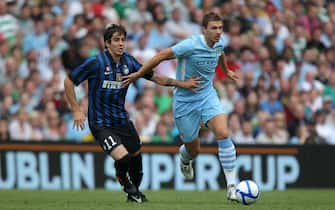 Manchester City's Edin Dzeko and Inter Milan's Ricardo Alvarez (left) battle for the ball   (Photo by PA Images via Getty Images)